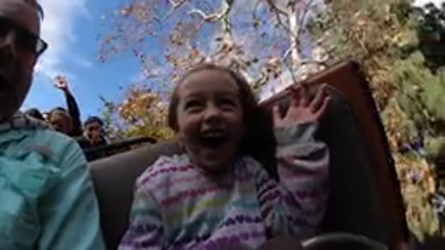 DISNEYLAND CALIFORNIA-2020: Little Girl Having A Blast While Riding A Roller Coaster