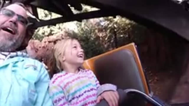DISNEYLAND CALIFORNIA-2020: Father And Daughter Ride The Roller Coaster