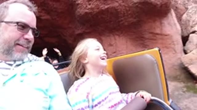 DISNEYLAND CALIFORNIA-2020: A Young Blonde Girl Riding A Mining Theme Ride