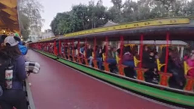 DISNEYLAND CALIFORNIA-2020: View Of Red Green And Yellow Tour Train On A Clear Day