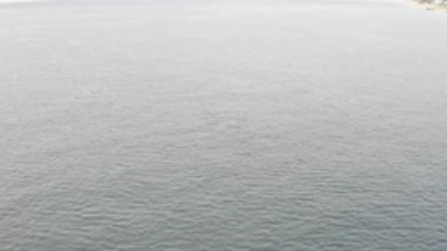 EAST CAPE BAJA CALIFORNIA SUR-2019: Drone Footage Of A Large Lake On A Grey Day