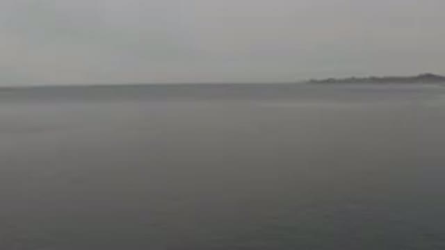 Aerial View Of Calm Grey Ocean