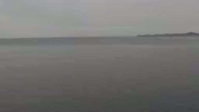 Aerial View Of Calm Grey Ocean