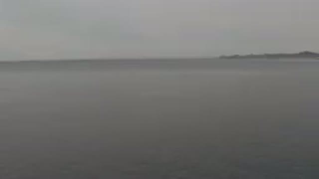 Aerial View Of Calm Grey Ocean