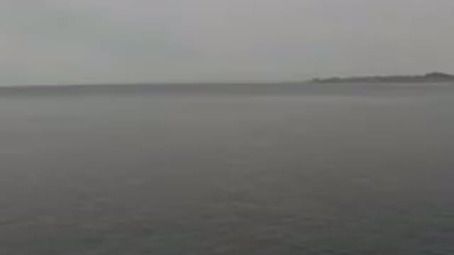 Aerial View Of Calm Grey Sea Horizon