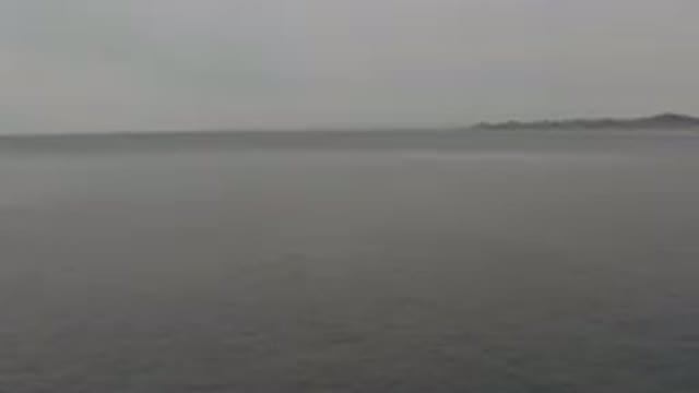 Aerial View Of Calm Overcast Sea