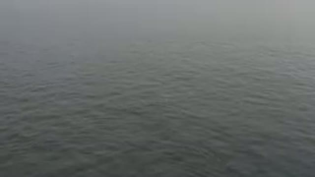 Calm Grey Ocean Water Surface With Ripples