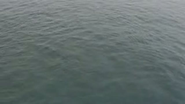 Aerial View Of Calm Grey Ocean Surface