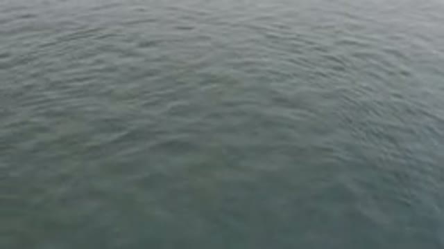 Aerial View Of Calm Grey Ocean Surface