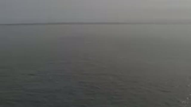 Aerial View Of Calm Grey Ocean Surface
