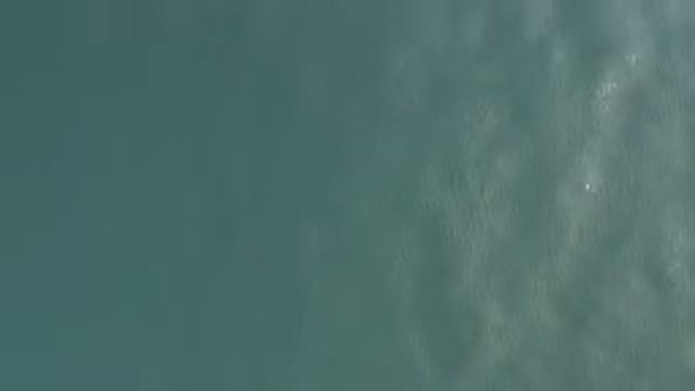 Aerial View Of Turquoise Ocean Surface Ripples