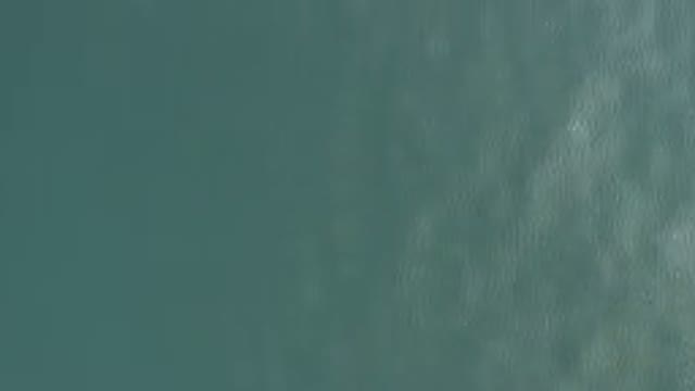 Aerial View Of Turquoise Ocean Surface