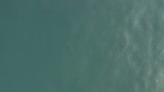 Aerial View Of Turquoise Ocean Water Surface