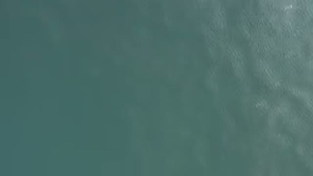 Aerial View Of Turquoise Ocean Surface