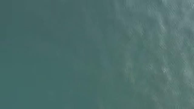 Aerial View Of Turquoise Water Surface