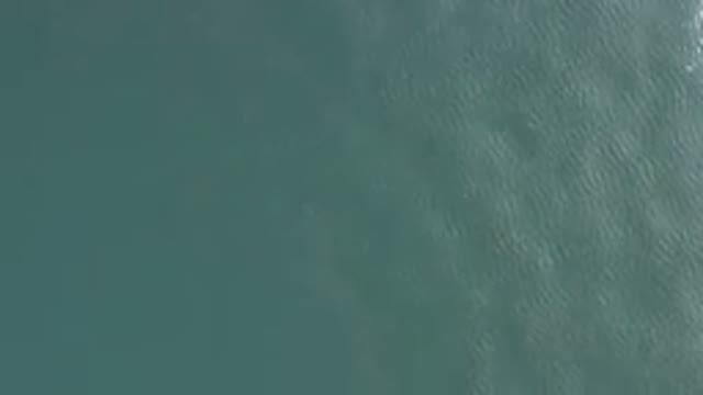 Aerial View Of Calm Turquoise Water Surface
