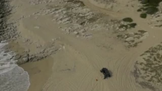 EAST CAPE BAJA CALIFORNIA SUR-2019: Aerial View Of A Beach With Sea Waves And Rocks