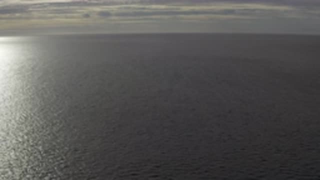 EAST CAPE BCS MEXICO-2019: A Panning View Of Sunlight Shining On Rippling Calm
