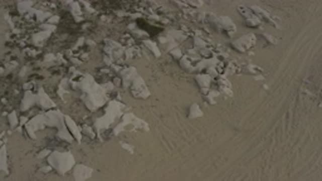 EAST CAPE BCS MEXICO-2019: A Recording Of A Beach With Some Rocks Tucks On The