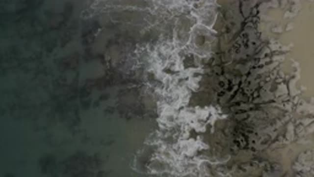 EAST CAPE BCS MEXICO-2019: White Ocean Waves With Bubbles Hitting Then Receding