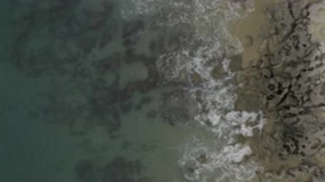 EAST CAPE BCS MEXICO-2019: Aerial View Of Waves Crashing With White Peaks On