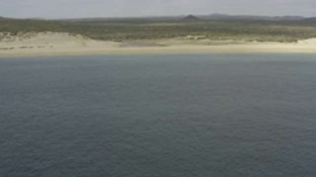 EAST CAPE BCS MEXICO-2019: View Of Tan Beach And Blue Ocean Water On A Clear Day