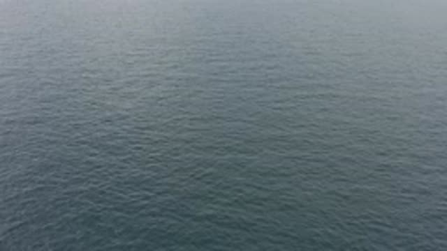 EAST CAPE BCS MEXICO-2019: A Video Of A Lake As The Camera Pans Up Over The