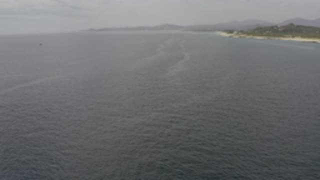 EAST CAPE BCS MEXICO-2019: Large Body Of Water With Sandy And Rocky Coast Line