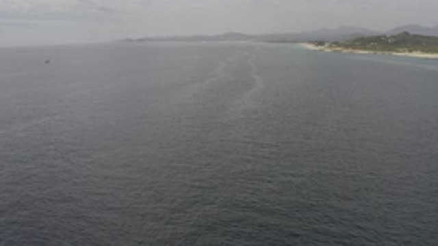 EAST CAPE BCS MEXICO-2019: View Of Blue Ocean Water And Green Island On A Clear