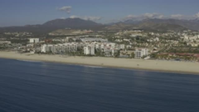 EAST CAPE BCS MEXICO-2019: A Recording Of A Beach With Some Buildings Near To