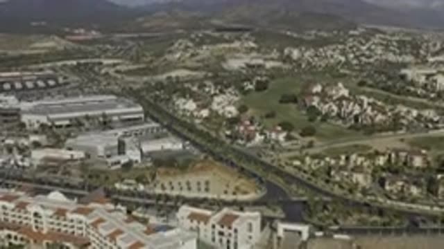 EAST CAPE BCS MEXICO-2019: An Aerial View Of A Town With Buildings And Houses