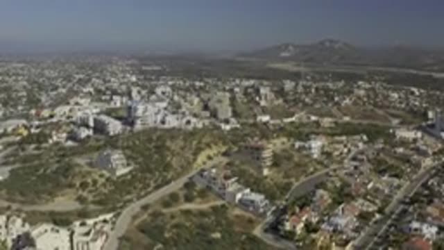 EAST CAPE BCS MEXICO-2019: A Drone Is Flying Over A Community Buildings And Mountains