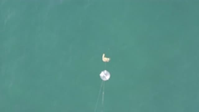 EAST CAPE BCS MEXICO-2019: A Birds Eye View Of An Object Hanging Over A Body Of Water