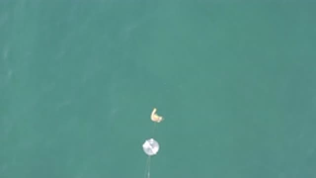 EAST CAPE BCS MEXICO-2019: Person Angling in Beautiful Blue Water with Yellow Bait Float