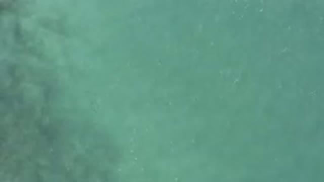 Aerial View Of Turquoise Ocean Surface