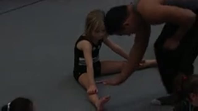 CABO SAN LUCAS MEXICO-2020: Fitness Instructor Taps The Foot Of A Young Female