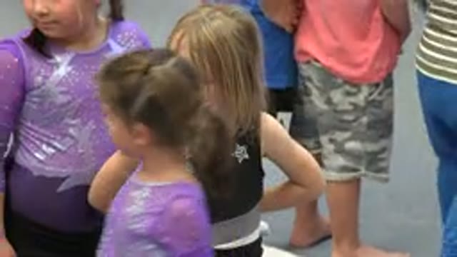 CABO SAN LUCAS MEXICO-2020: Three Girls In Gymnastic Costumes Follow Each Other