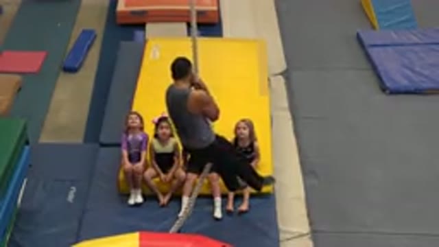 CABO SAN LUCAS MEXICO-2020: Gymnastics Coach Spins Around As He Demonstrates How