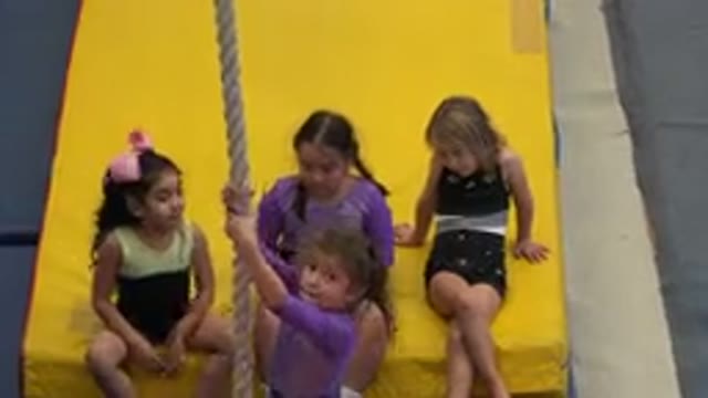 CABO SAN LUCAS MEXICO-2020: Child Climbing A Rope While Her Friends Watch