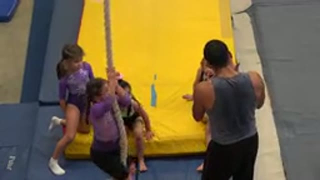 CABO SAN LUCAS MEXICO-2020: Children Practice Rope Climbing Under Instructor Guidance