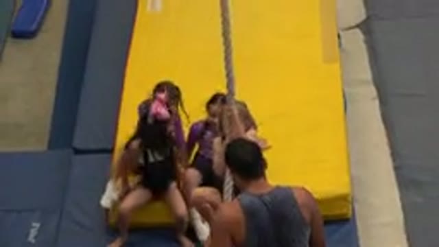 CABO SAN LUCAS MEXICO-2020: Little Girl Tries To Climb Up A Rope