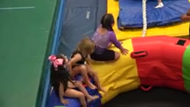 CABO SAN LUCAS MEXICO-2020: Four Young Girls Play On A Jump Inflatable While A