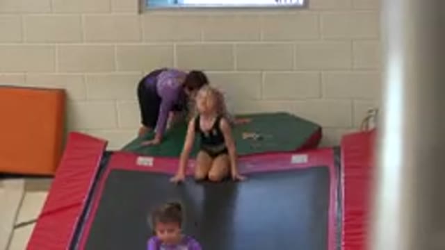 CABO SAN LUCAS MEXICO-2020: Kids Tumble Down Black And Red Mat In Indoor Gymnasium