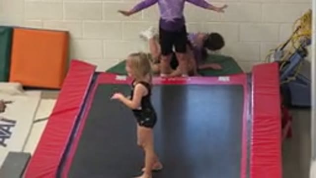 CABO SAN LUCAS MEXICO-2020: Young Girl Being Instructed On Trampoline By