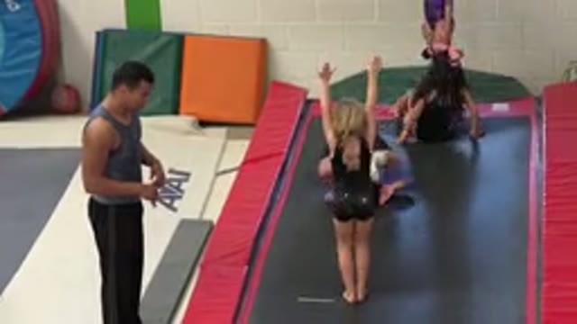 CABO SAN LUCAS MEXICO-2020: Little Girls Practice Gymnastic Maneuvers On