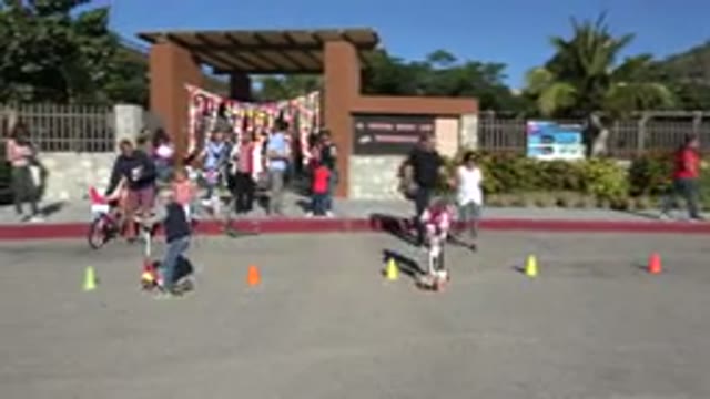 CABO SAN LUCAS MEXICO-2020: Kids Riding A Scooter In The Street At Cabo San