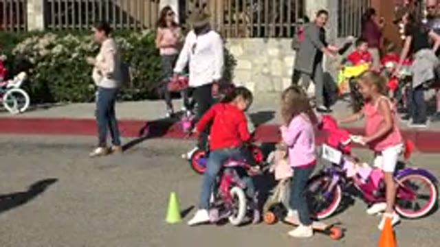 CABO SAN LUCAS MEXICO-2020: Happy Kids Playing With Their Bikes And Scooters In