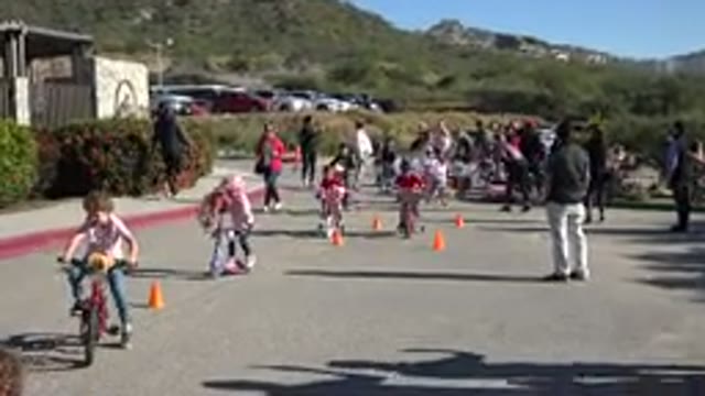 CABO SAN LUCAS MEXICO-2020: Kids Ride Bikes And Scooters Through An Obstacle Course