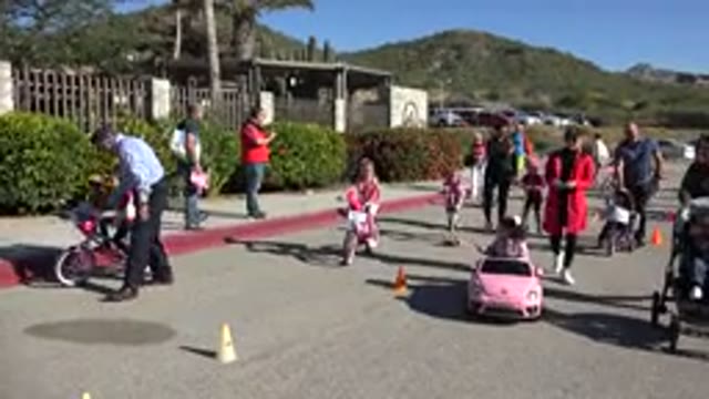 CABO SAN LUCAS MEXICO-2020: Children Walking, Running, and Riding Bicycles on the Street
