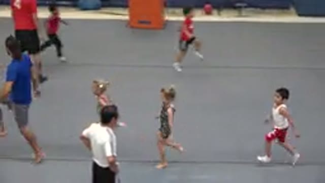 CABO SAN LUCAS MEXICO-2020: Young Girls Running Around The Mat During A Gymnastics Lesson